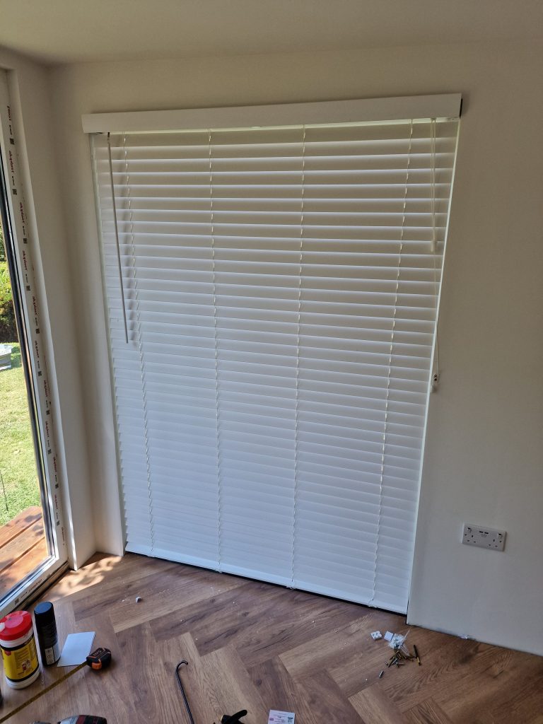 Blinds and herringbone flooring complete on garden office build in Southampton